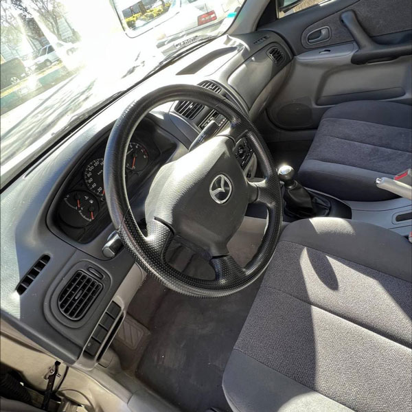 لوازم یدکی مزدا 323